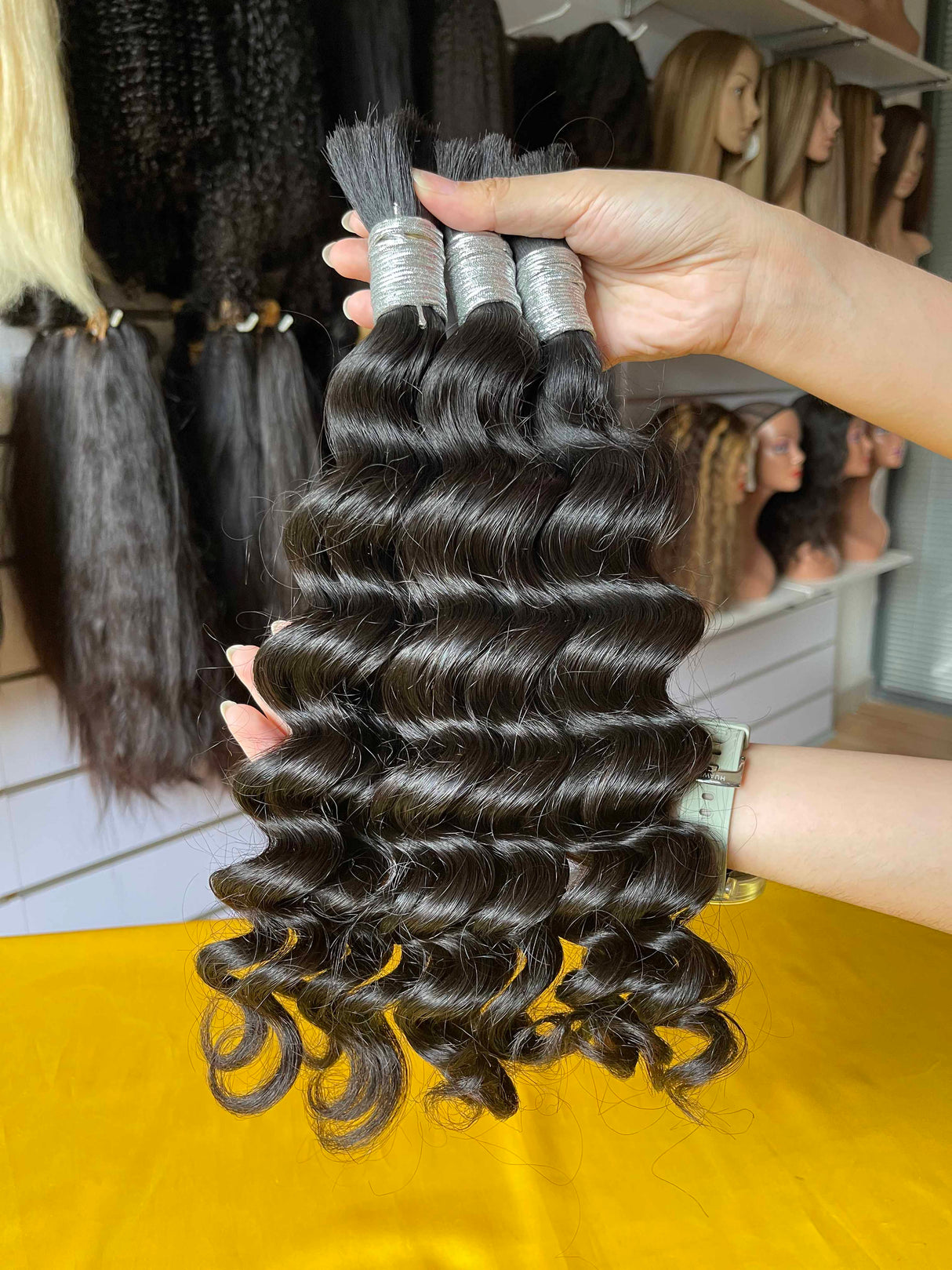 Bulk Hair For Braiding Side Profile View - Natural fit demonstration showing how bulk hair lays flat and demonstrates natural flow when held. Tight coiled texture visible in close-up view confirms premium unprocessed Brazilian virgin human hair with natural sheen indicating no chemical processing da