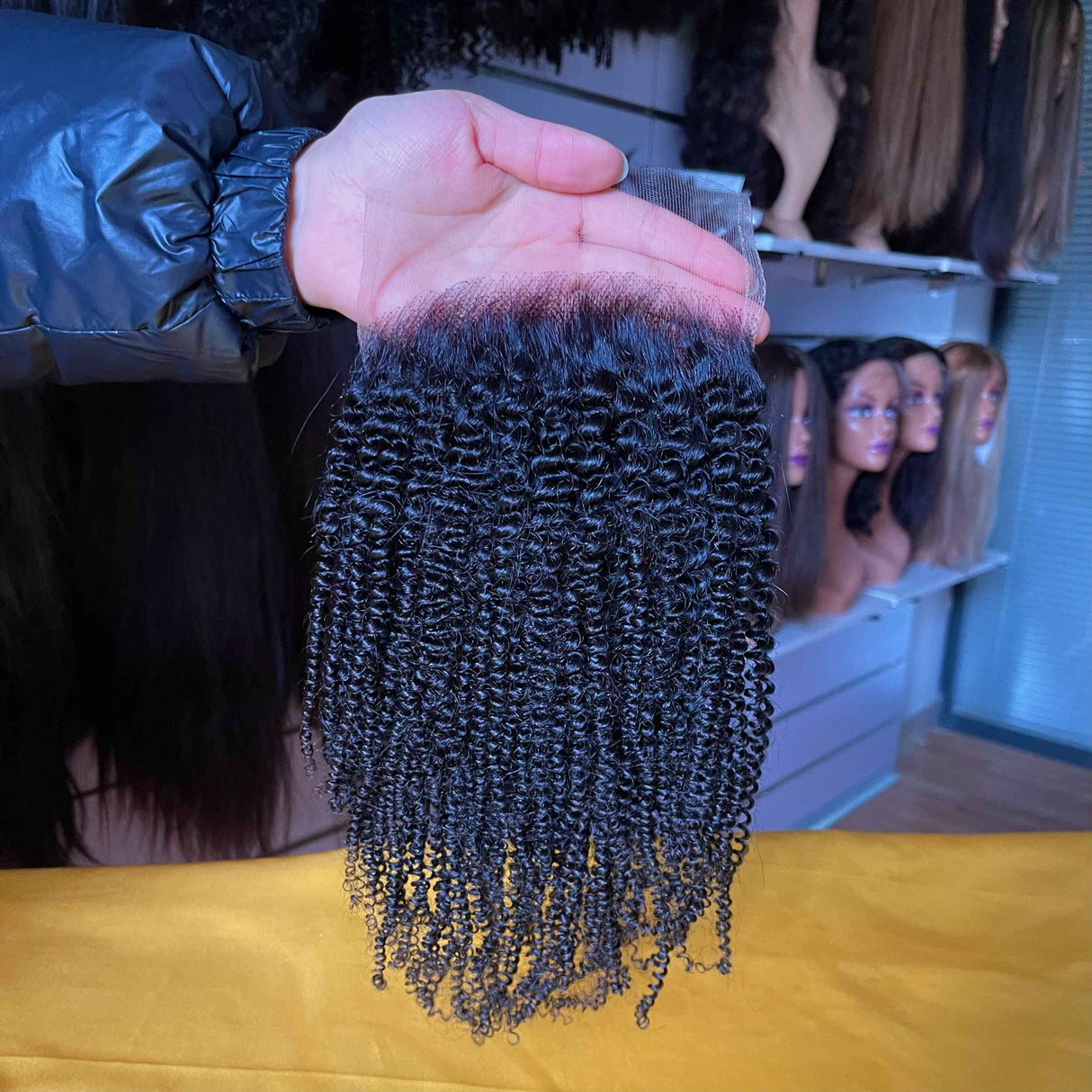 Coily Curly HD Lace Closure Side Profile - Natural appearance and fit demonstration showing how tight curly texture maintains volume while transparent HD lace disappears against skin tone. 130% density Brazilian virgin hair provides full coverage with comfortable wear.