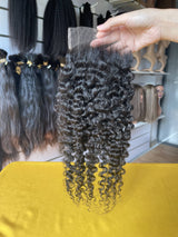QWB Queen Weave Beauty - Product construction quality documentation showing reinforced weft attachment system. Machine double stitching anchors each hair strand to the base ensuring durability during extended wear periods. Close-up reveals minimal bulk at seam edges for comfortable lay-flat installa