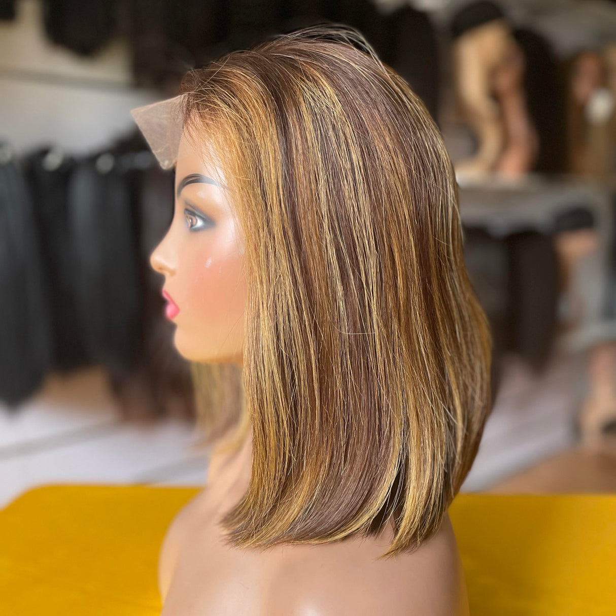 Straight Lace Closure Bob Styling Demonstration - Free part design allows natural-looking divisions anywhere within the compact 5x5 closure area shown on mannequin head. Deep natural black (#1b) demonstrates authentic virgin human hair appearance with smooth pin-straight texture maintaining sleek bo