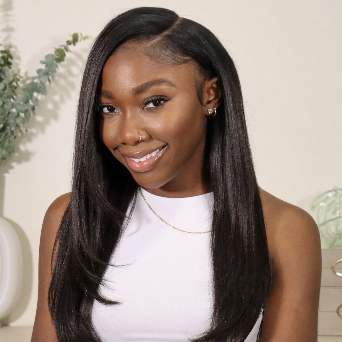 Light Yaki Hair Heat Styling Demonstration - Premium Brazilian virgin human hair bundles shown styled with heat tools demonstrating versatility. Light yaki texture can be wand curled into elegant curls or flat-ironed completely straight without damage. Cuticle intact construction ensures tangle-free