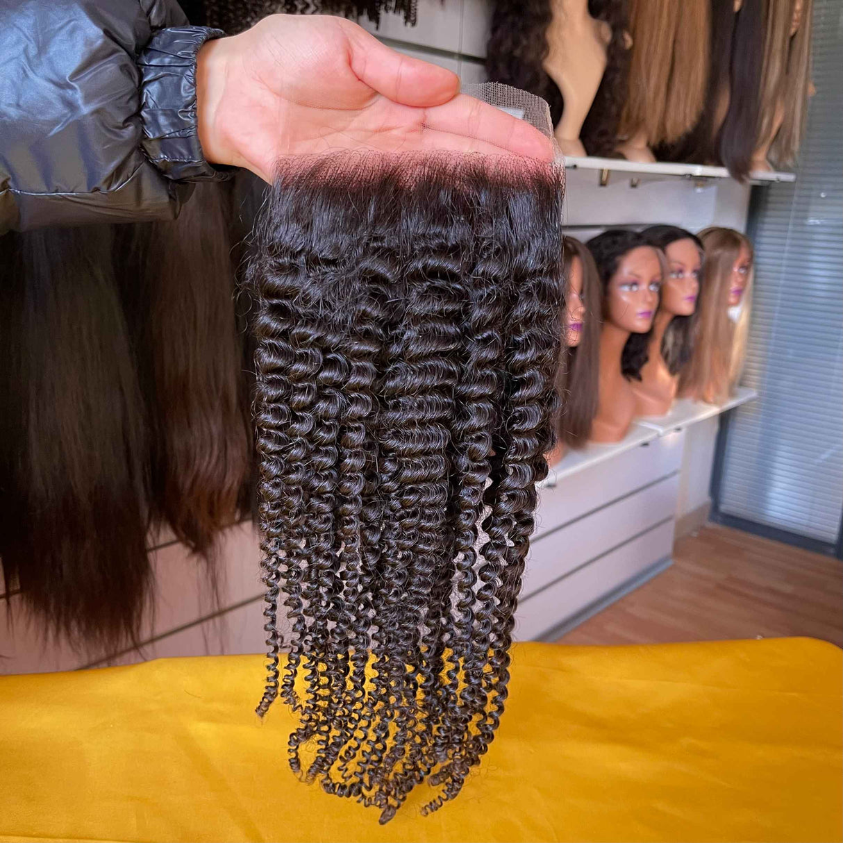 Kinky Curly 5X5 HD Lace Closure Side Profile - Natural appearance and fit demonstration showing how kinky curly texture blends seamlessly with skin tone. Transparent HD lace disappears against skin while premium Brazilian virgin human hair provides comfortable wear suitable for professional daily us