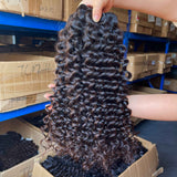 QWB Queen Weave Beauty - Detailed texture verification macro photography documenting tightly coiled deep wave S-pattern curl formation. Close inspection reveals uniform curl formation throughout entire strand length from weft edge through tip ends, confirming consistent steam processing during manuf