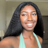QWB Kinky Straight Drawstring Ponytail Extension showcasing natural hair finish quality and versatile easy styling capability of 100% Brazilian virgin human hair material. Deep #1b black color with uniform matte texture appearance characteristic of steam-processed kinky straight pattern â€?fine coile